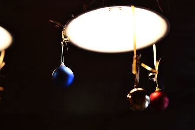 Low angle view of illuminated light bulb