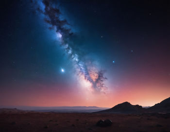 Scenic view of sea against sky at night