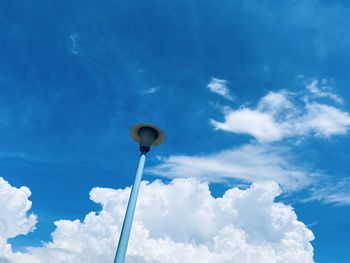 Low angle view of street light against sky