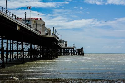 Pier over sea against sky