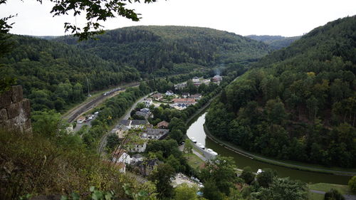 High angle view of trees and buildings against sky