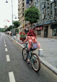 Woman walking on road