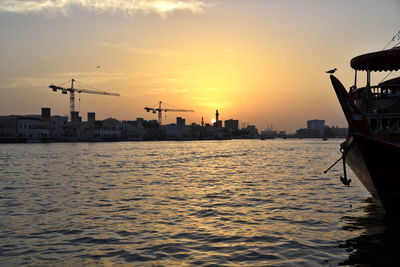 Dubai skyline from dubai creek harbour and dubai canal to downtown and business bay, uae