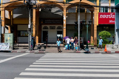 Group of people crossing road