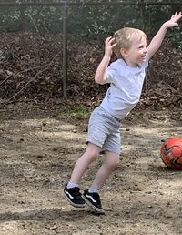 Boy playing with ball