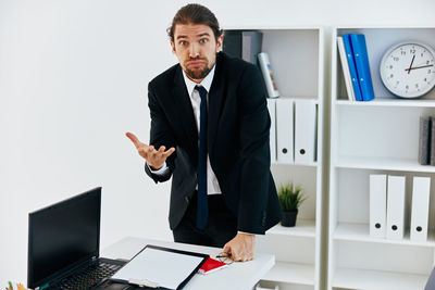 Full length of man working on table