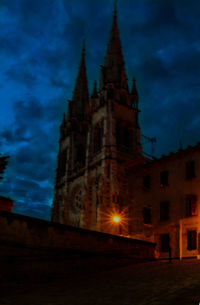 Low angle view of bell tower at night