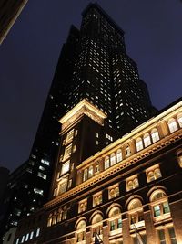 Low angle view of buildings at night