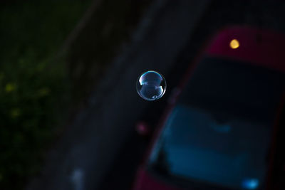 Close-up of bubbles against blurred background