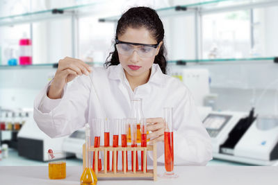 Focused scientist working in laboratory