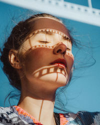 Close-up portrait of a serious young woman