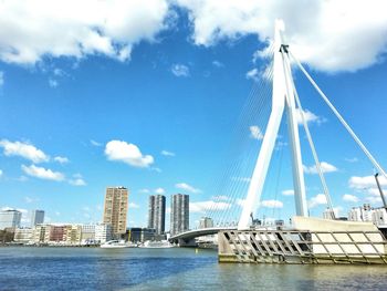 Low angle view of river against cloudy sky