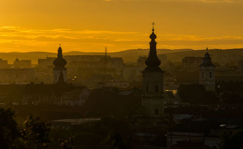 Cityscape of cluj-napoca city in the morning golden light.