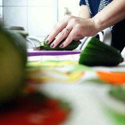 Close-up of hands on table