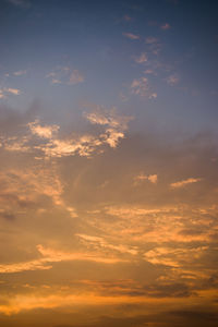 Low angle view of dramatic sky during sunset