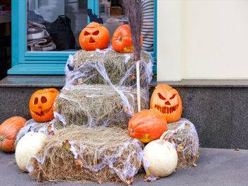 A comic installation for halloween near the entrance of a residential building.