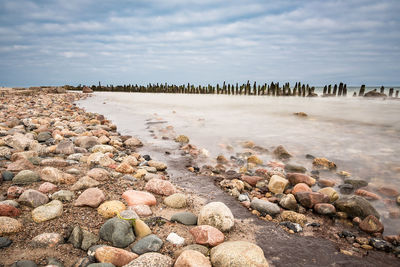 Scenic view of beach against sky