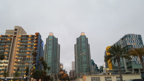 Low angle view of modern buildings against sky