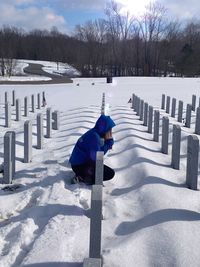 Man on snow covered field