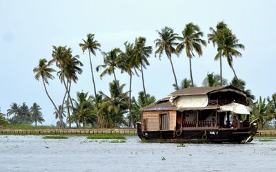 Houseboat in kerala backwaters against sky