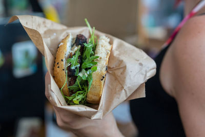 Close-up of hand holding food