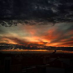 Scenic view of dramatic sky during sunset