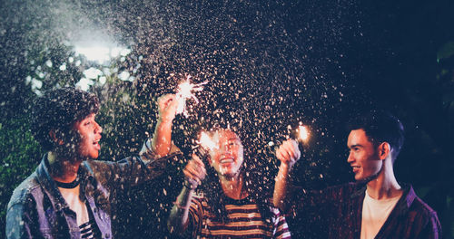 Group of people enjoying at music concert