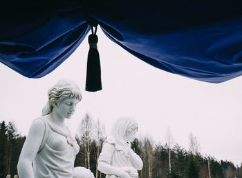 Low angle view of statue against clear sky