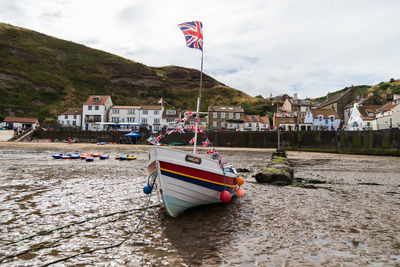 American flag in front of buildings