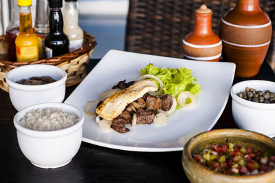 Close-up of food served on table