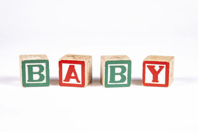 Close-up of toys over white background