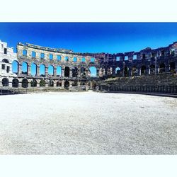 View of historic building against blue sky