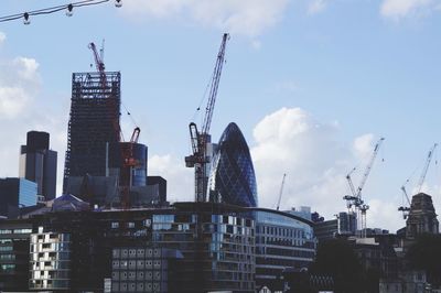 Low angle view of construction site against sky