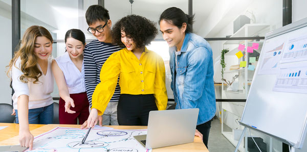 Group of people working on laptop