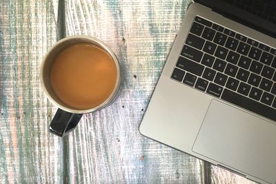 High angle view of coffee cup on table