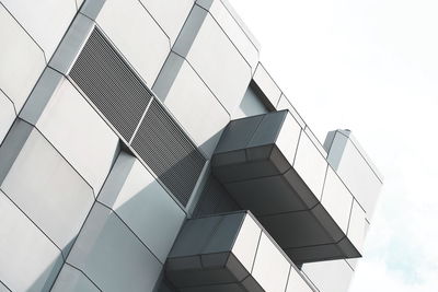 Low angle view of modern building against sky