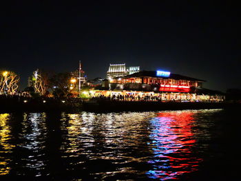 Illuminated city lit up at night