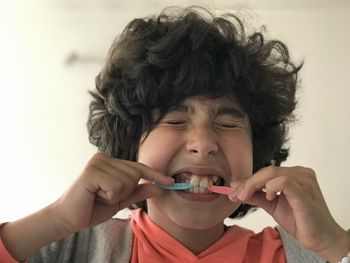 Close-up portrait of boy holding ice cream