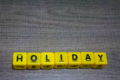 Close-up of yellow text