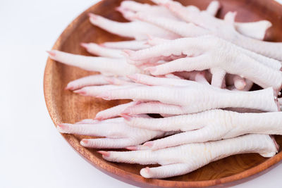 Close-up of cake on white background