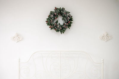 Cute christmas tree wreath hanging on the wall