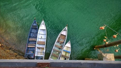 High angle view of boat moored in lake