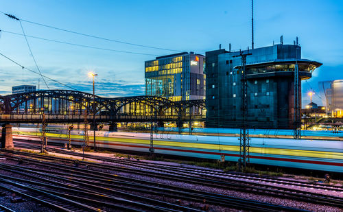 Train on railroad tracks against sky