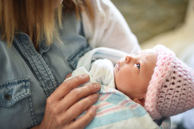 Midsection of mother with daughter