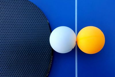 Close-up of balls in blue background