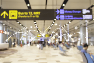 Close-up of illuminated lighting equipment at night