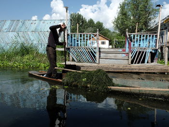 Reflection of man on water