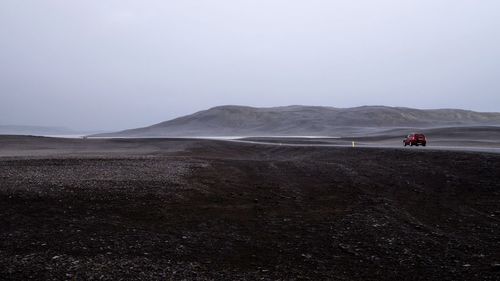 Scenic view of desert against sky