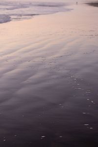 High angle view of beach against sky during sunset