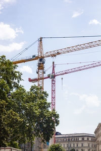 Low angle view of crane at construction site